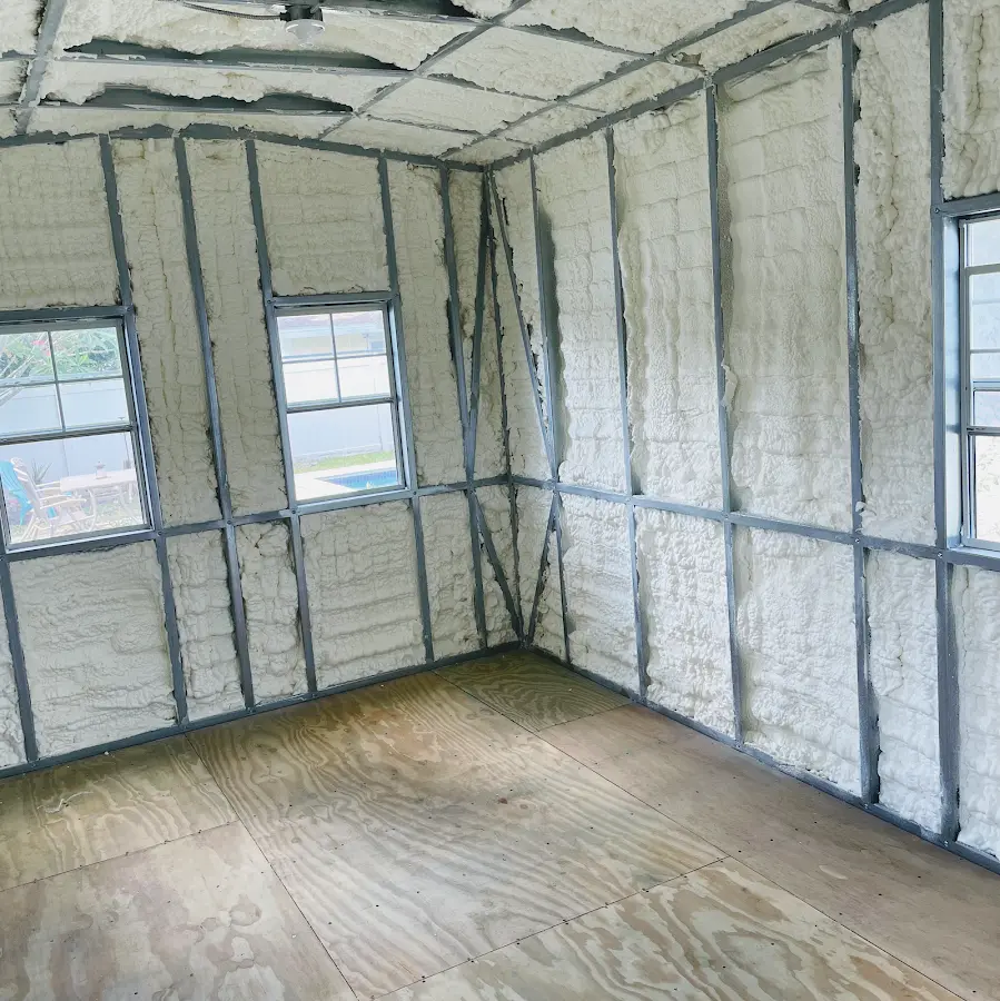 Closed-cell spray foam insulation applied to wall cavities in a residential project in East Caln